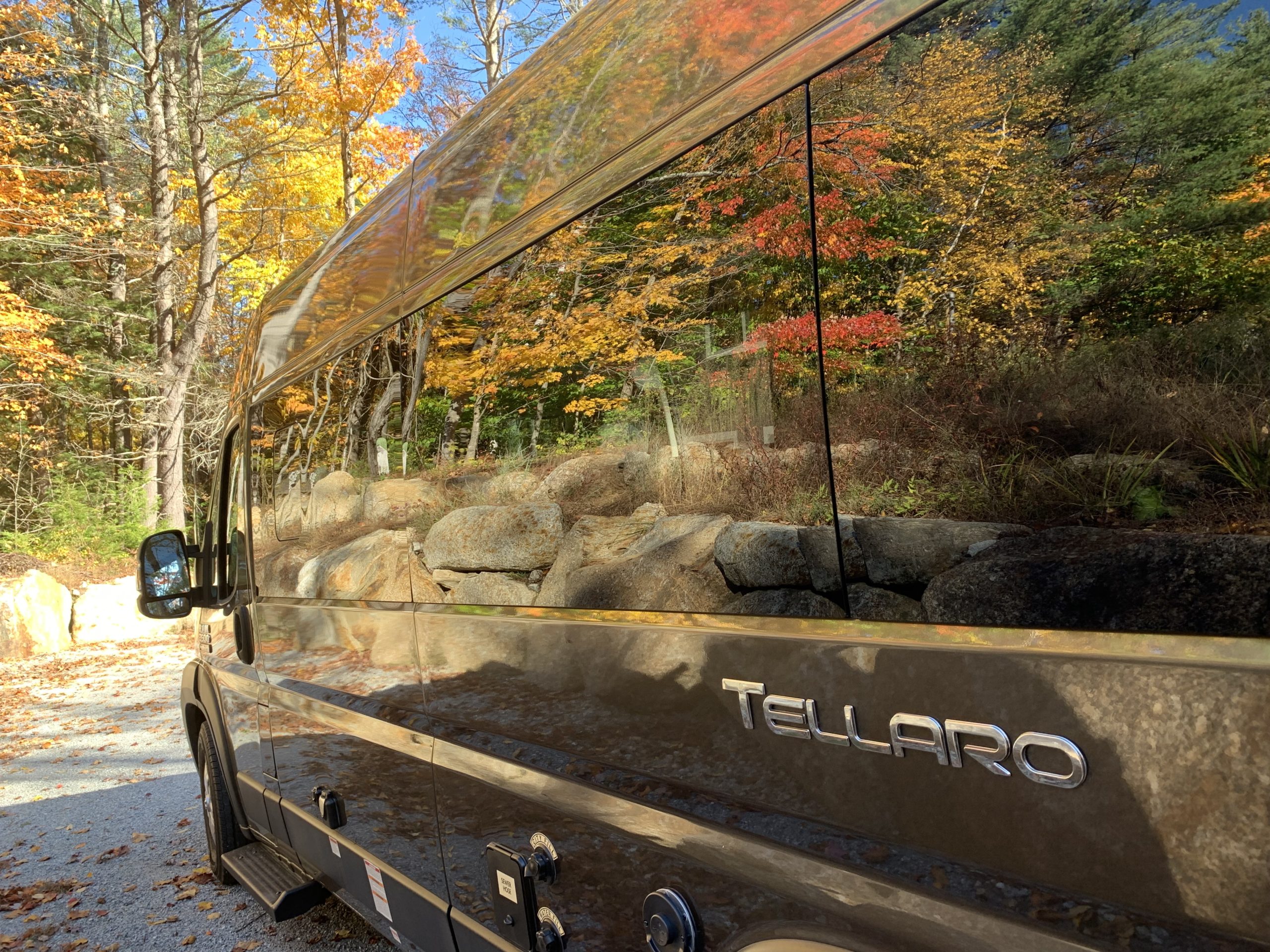 VanLife Roller Coaster Fall 2022, beautiful reflection of trees on side of van.